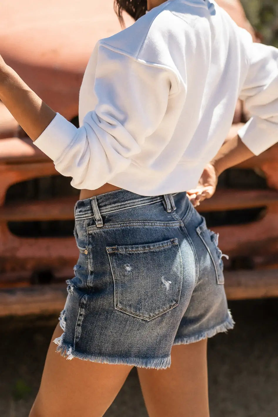 medium wash distressed shorts