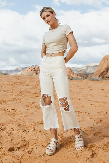 Distressed jeans in ivory 