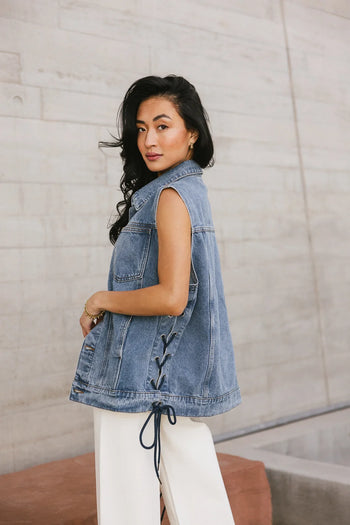 Adjustable side straps denim vest in medium wash 
