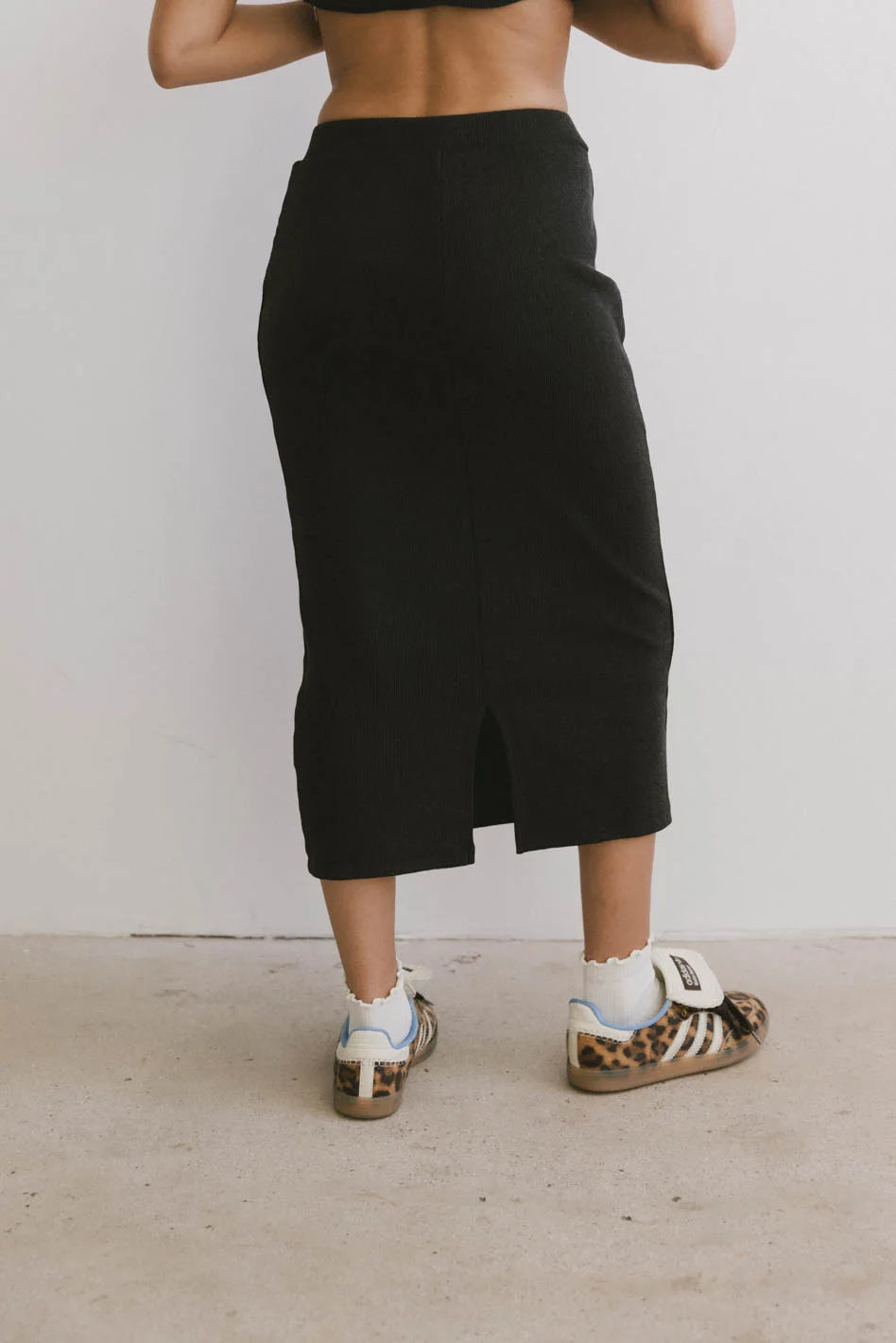 Back slit skirt in black 