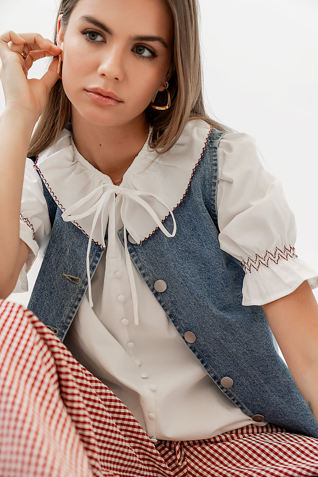 FAKE BUTTONS UP THE FRONT OF SHIRT 