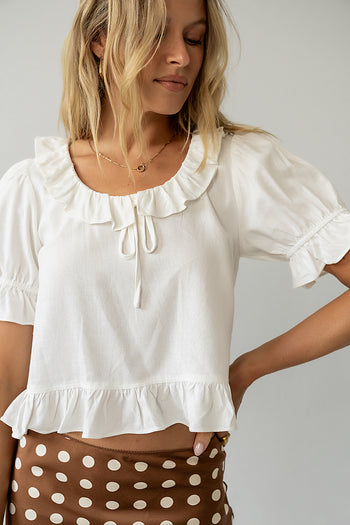 RUFFLE DETAIL ON WHITE BLOUSE